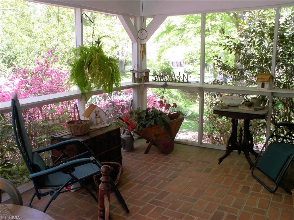 383 Hawthorne Road Elkin, NC 28621 - Photo 25 of 30 Screened porch looking toward back yard.