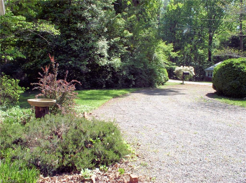 383 Hawthorne Road Elkin, NC 28621 - Photo 27 of 30 Circle drive with mature shrubbery looking toward Hawthorne Road.