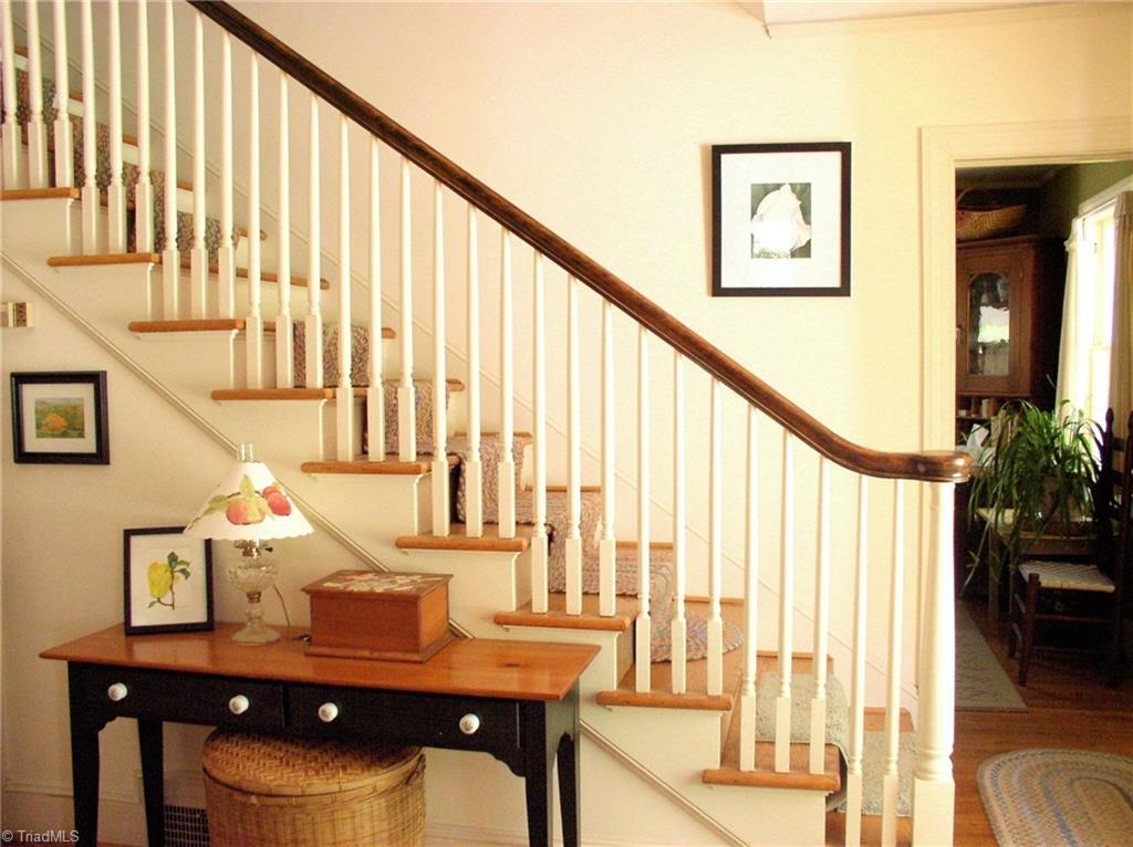 383 Hawthorne Road Elkin, NC 28621 - Photo 4 of 30 Gracious entry hall with steps leading to second level.