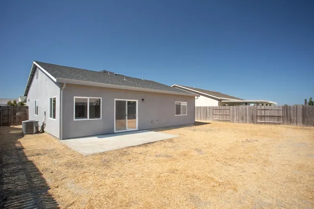 a house view with a outdoor space