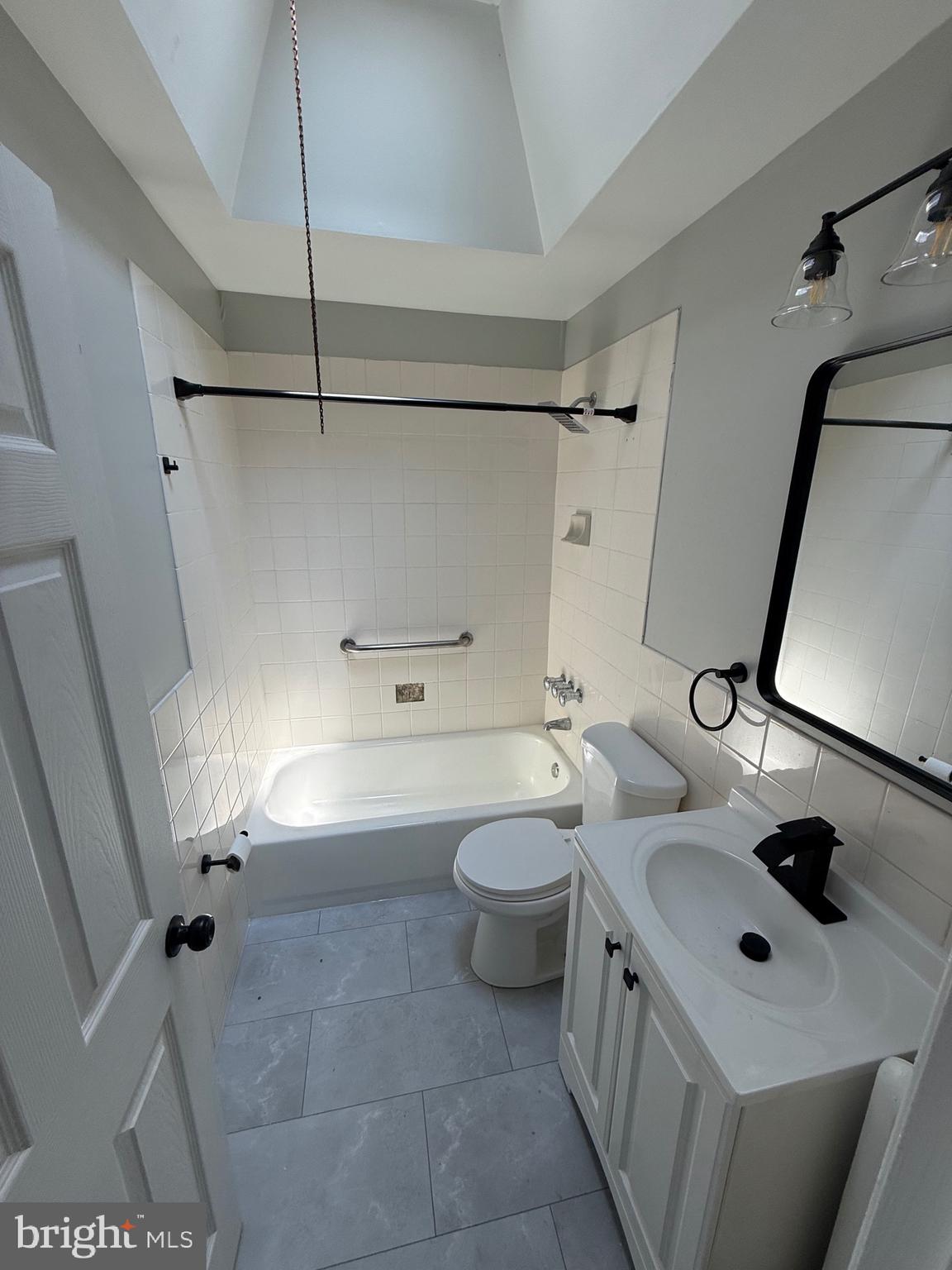 7150 Radbourne Road Upper Darby, PA 19082 - Photo 14 of 16 a bathroom with a sink a toilet and shower