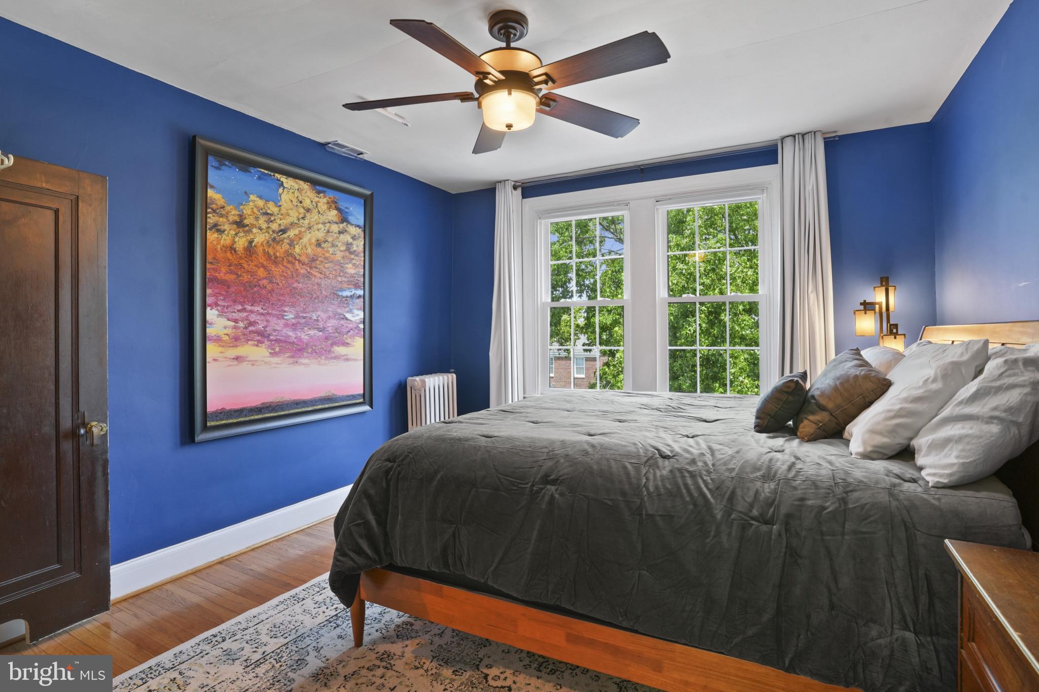 3618 Ednor Road Baltimore, MD 21218 - Photo 16 of 30 a bedroom with a bed and window