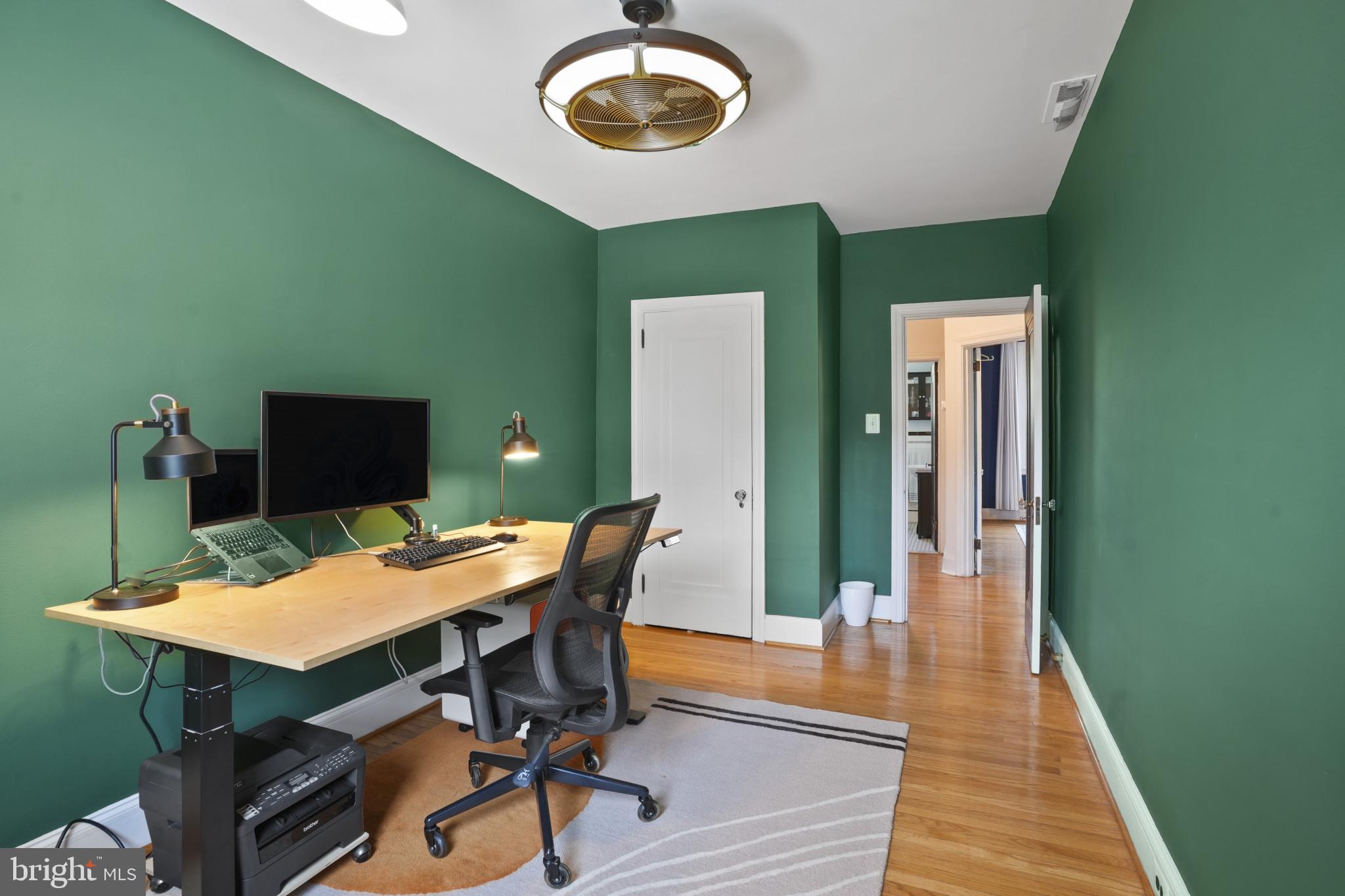 3618 Ednor Road Baltimore, MD 21218 - Photo 25 of 30 a view of a dining room with furniture and wooden floor