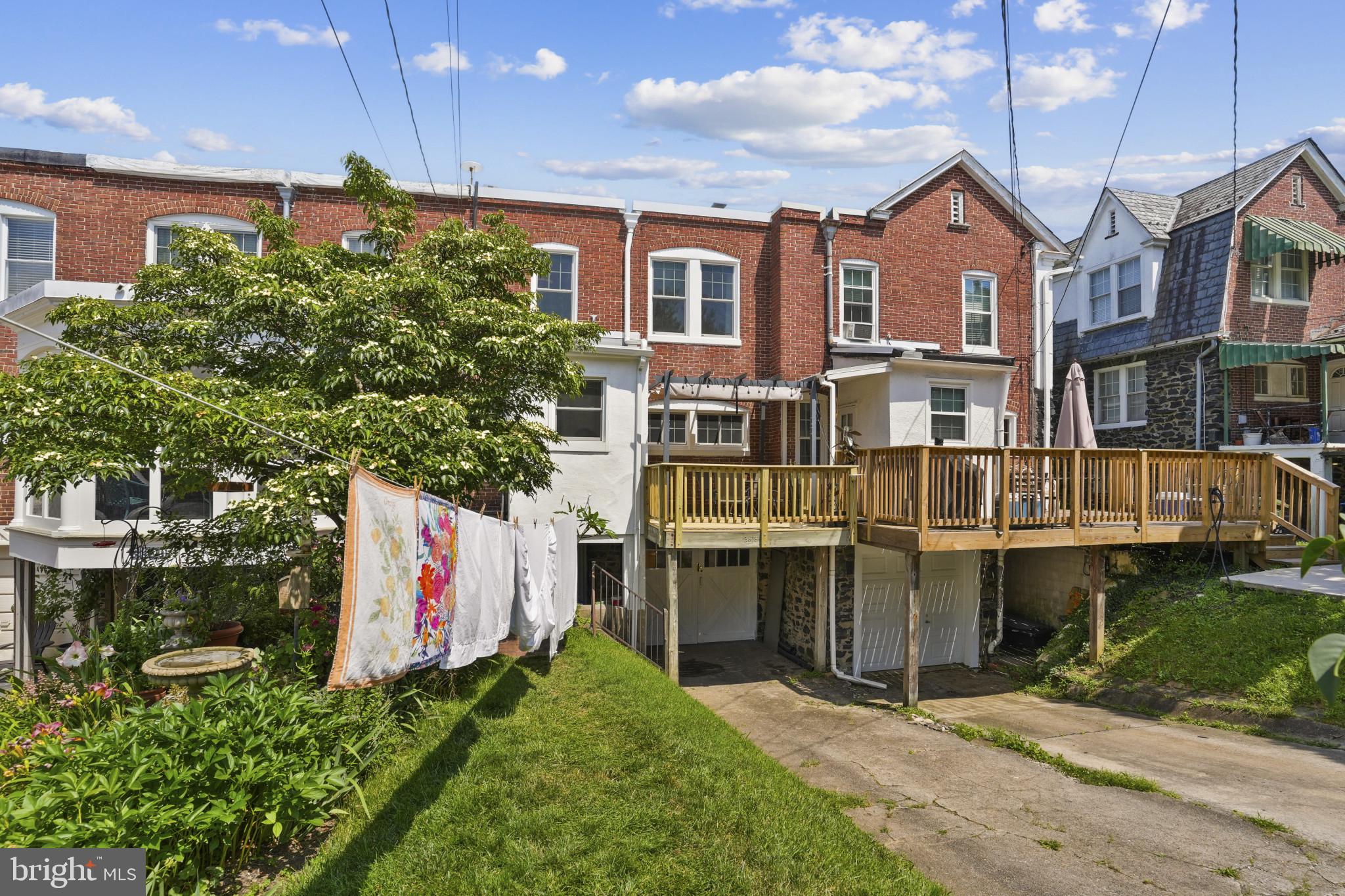 3618 Ednor Road Baltimore, MD 21218 - Photo 29 of 30 a front view of a house with a garden