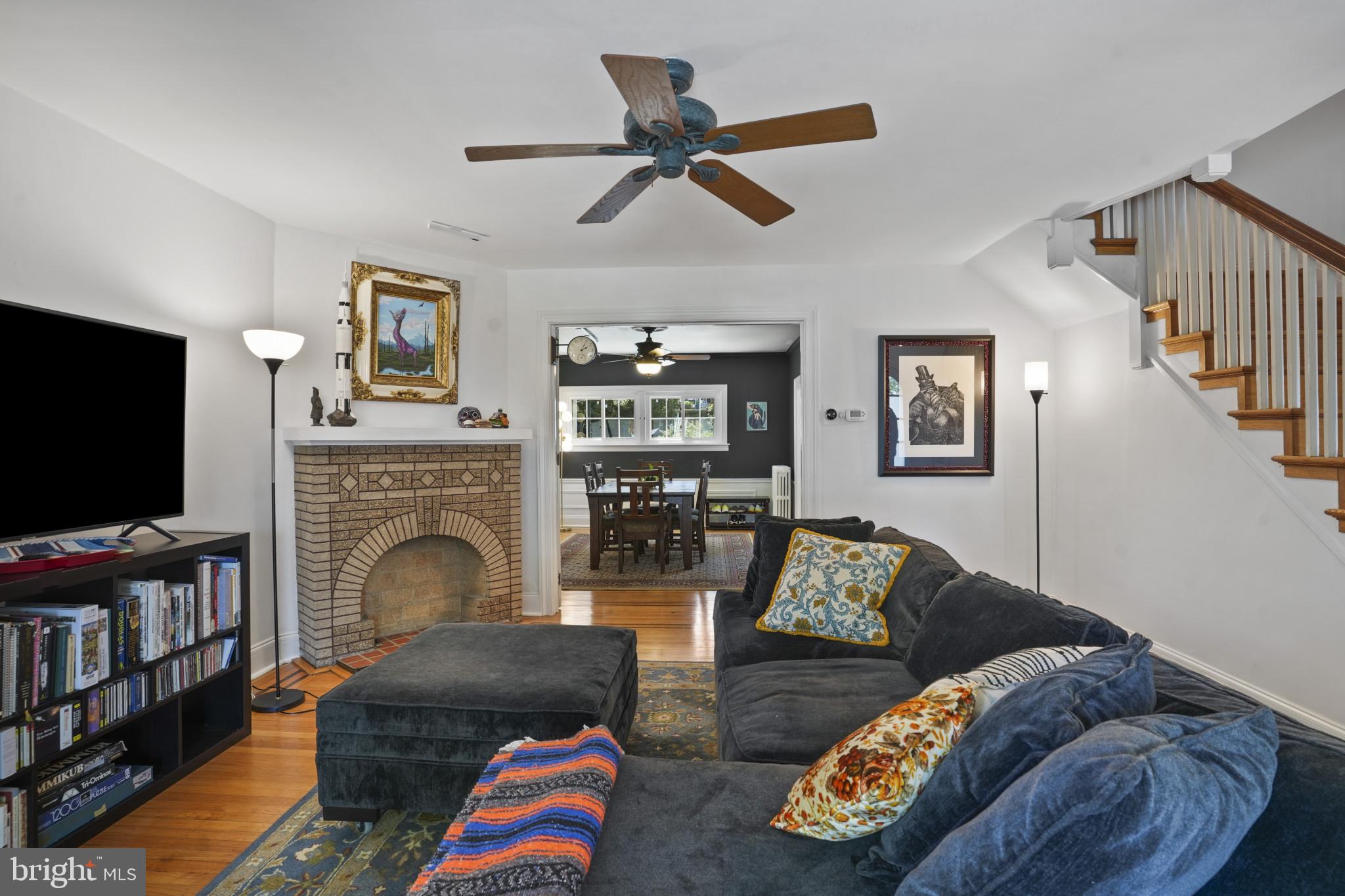 3618 Ednor Road Baltimore, MD 21218 - Photo 3 of 30 a living room with furniture and a flat screen tv