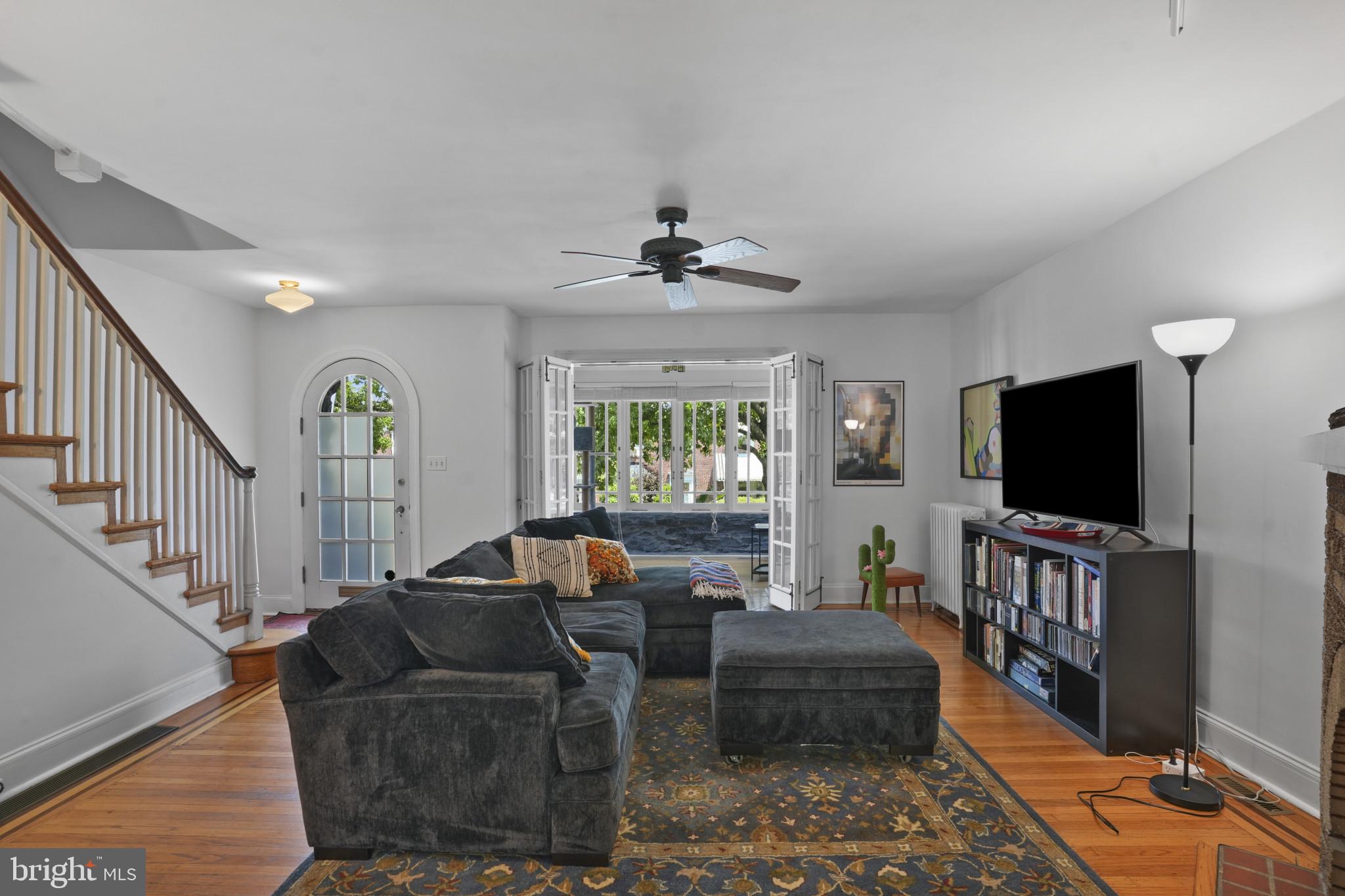 3618 Ednor Road Baltimore, MD 21218 - Photo 7 of 30 a living room with furniture and a flat screen tv