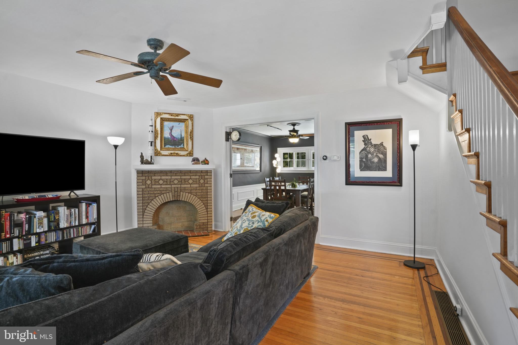 3618 Ednor Road Baltimore, MD 21218 - Photo 8 of 30 a living room with furniture and a flat screen tv