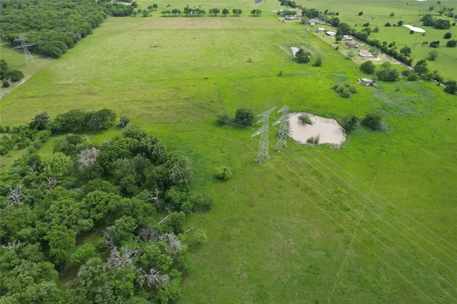 a view of a lake with a yard