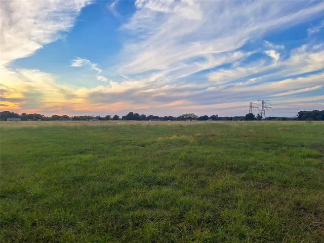 a view of a city with lots of trees