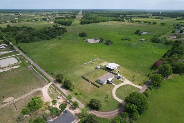a view of a lake with a yard