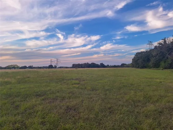 a view of an ocean and mountain