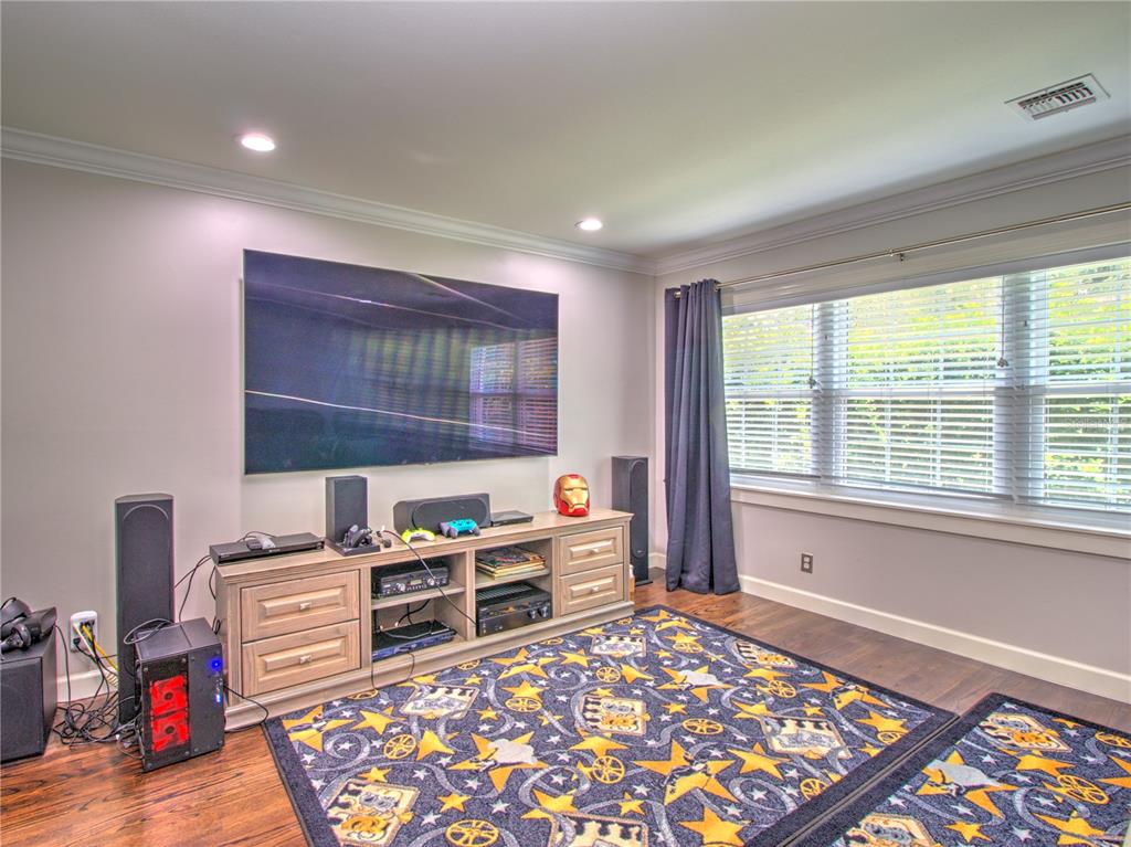 2313 Southeast 7th Street Ocala, FL 34471 - Photo 25 of 42 a room with furniture and a rug