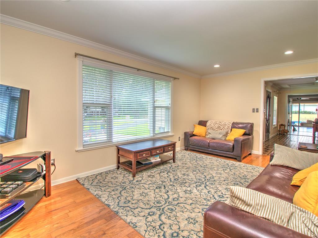 2313 Southeast 7th Street Ocala, FL 34471 - Photo 5 of 42 a living room with furniture and a window