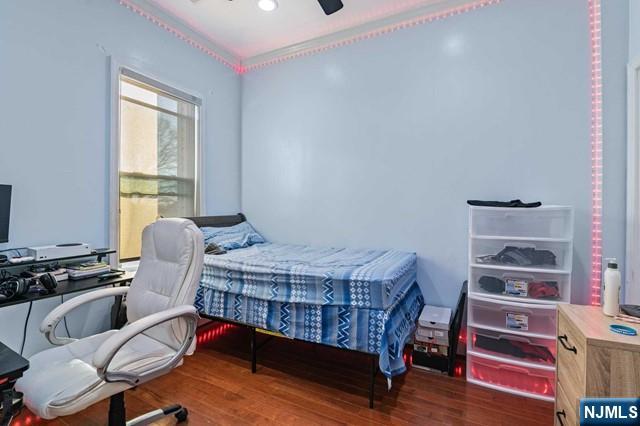 7 Martin Street Paterson, NJ 07501 - Photo 12 of 18 a bedroom with furniture and a window