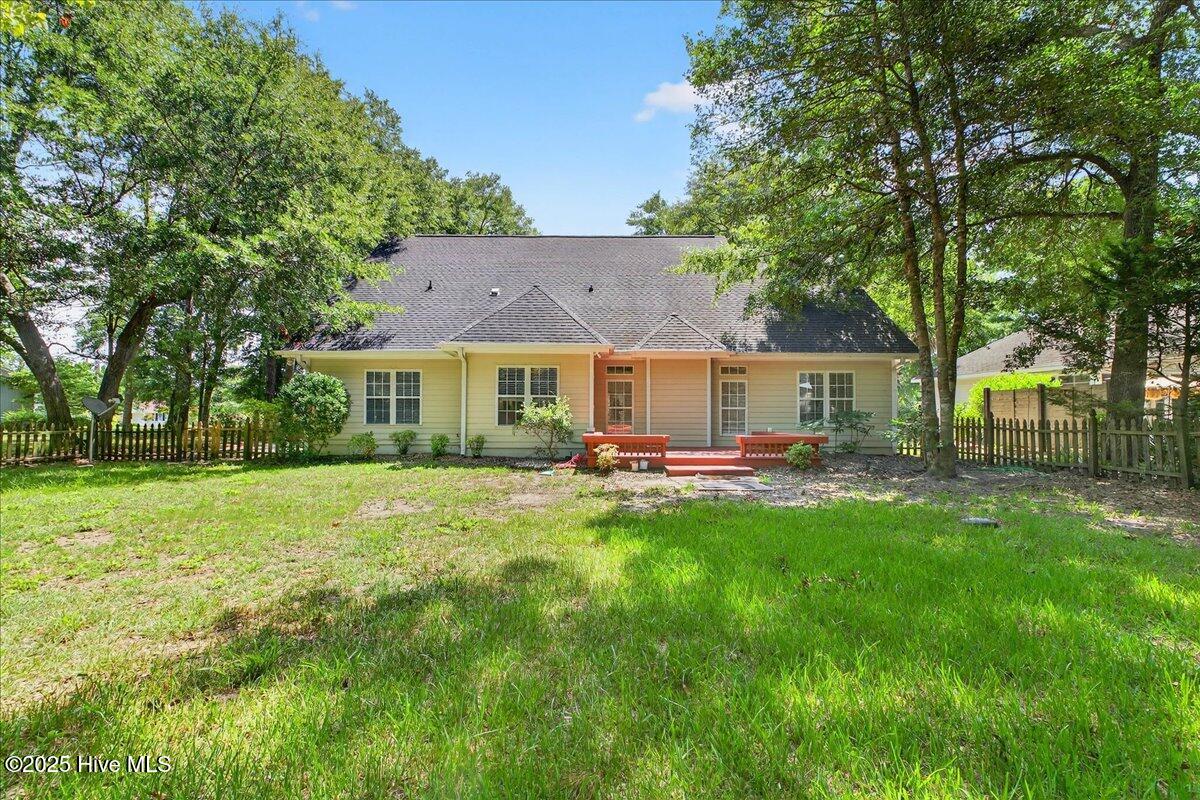 8985 Woodbine Road Southwest Sunset Beach, NC 28468 - Photo 54 of 65 View of spacious backyard