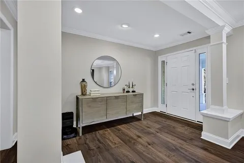 a view of room with wooden floor