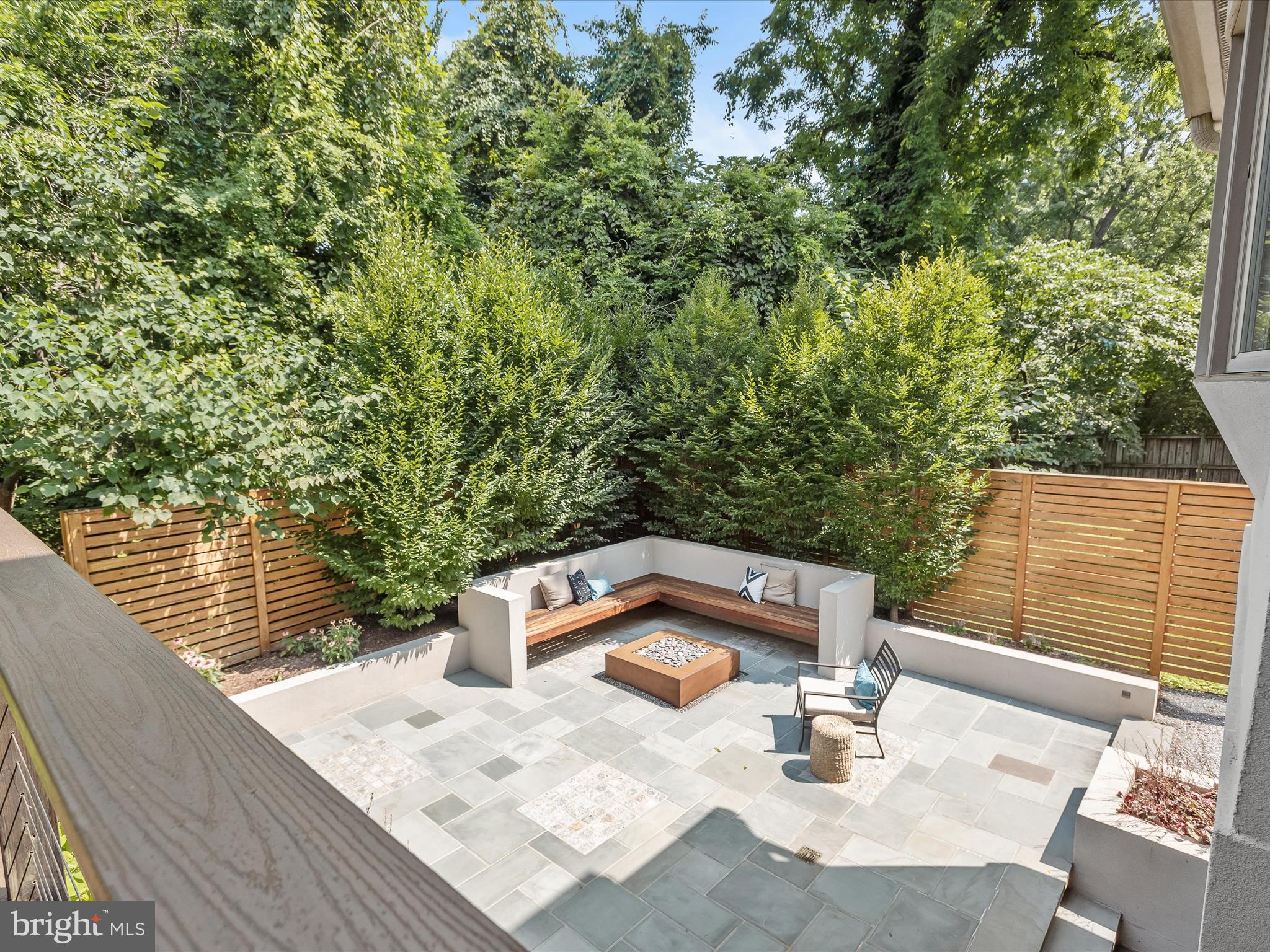 4711 24th Road North Arlington, VA 22207 - Photo 88 of 106 Stone patio with built-in seating around firepitt