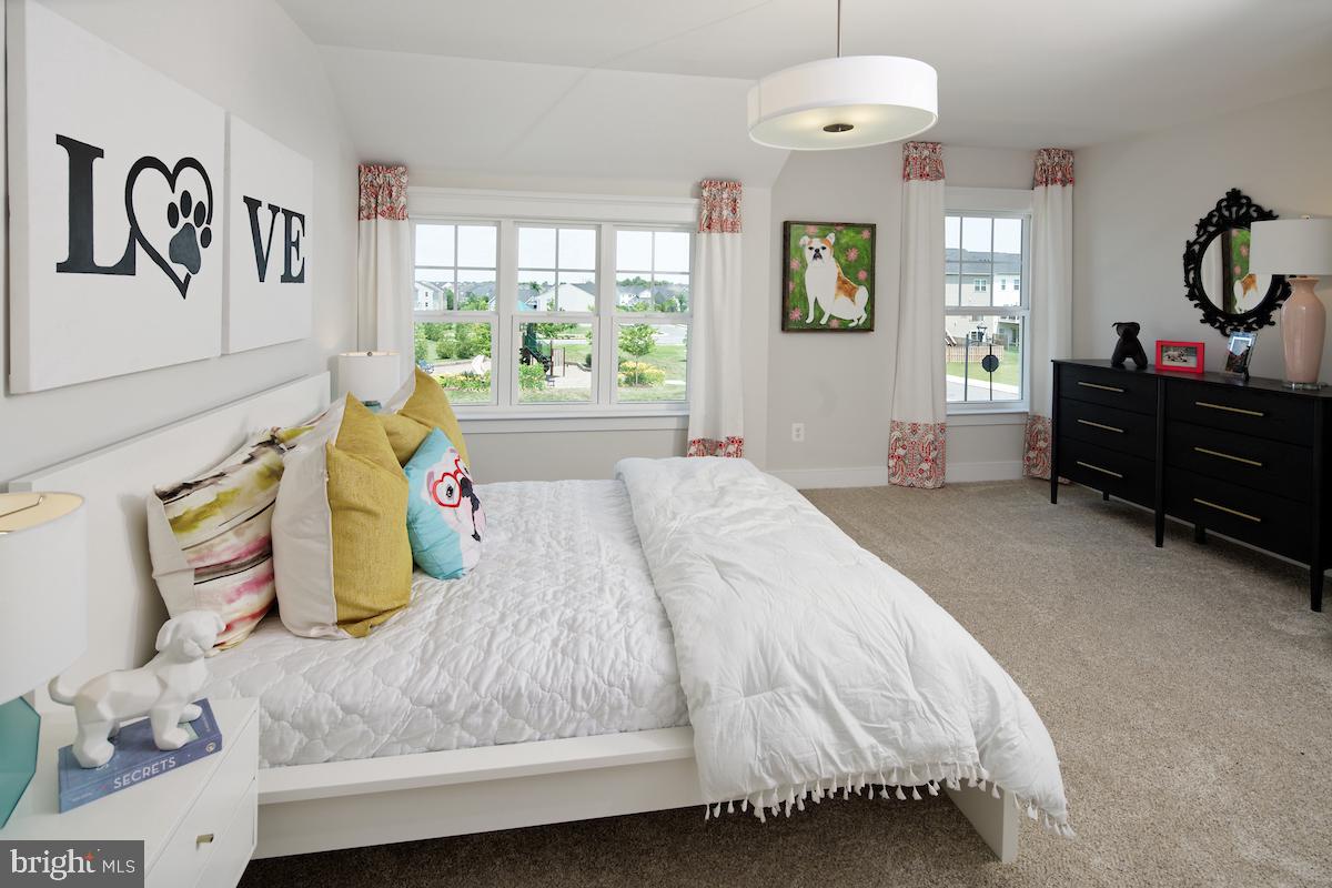 111 Interlace Way Stephenson, VA 22656 - Photo 15 of 27 a bedroom with a bed and a dresser