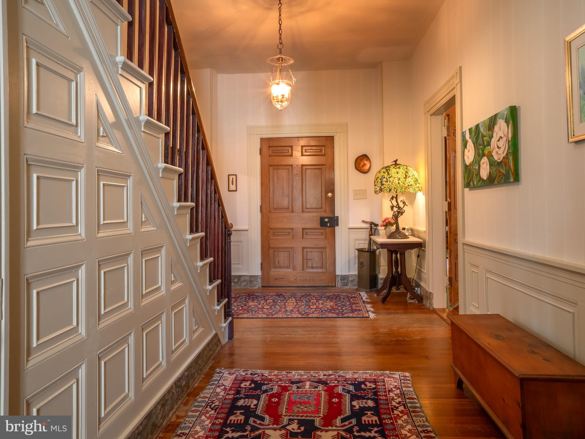 2345 Berry Hill Road Danville, VA 24541 - Photo 38 of 130 Heart Pine Flooring runs width of hall