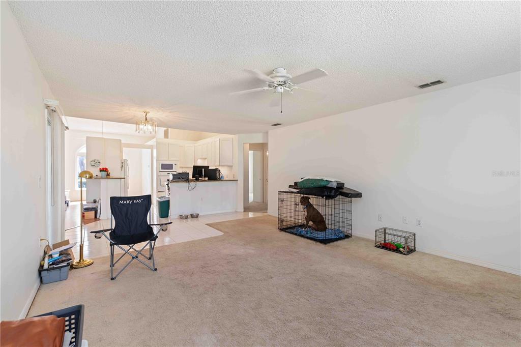 4513 Dover St Circle East Bradenton, FL 34203 - Photo 14 of 30 a view of a livingroom with furniture and a window