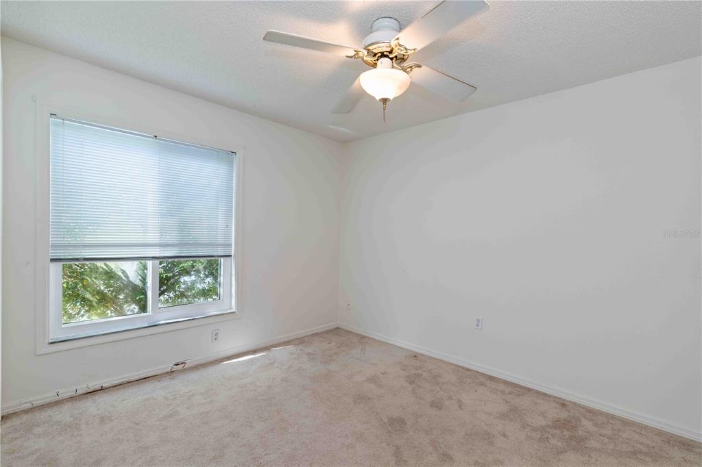 4513 Dover St Circle East Bradenton, FL 34203 - Photo 19 of 30 an empty room with a window