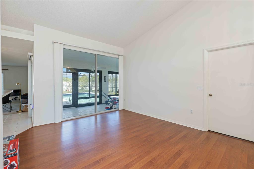 4513 Dover St Circle East Bradenton, FL 34203 - Photo 6 of 30 a view of an entryway with wooden floor