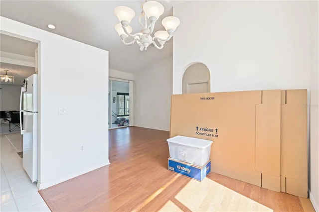 a view of a livingroom with furniture and wooden floor