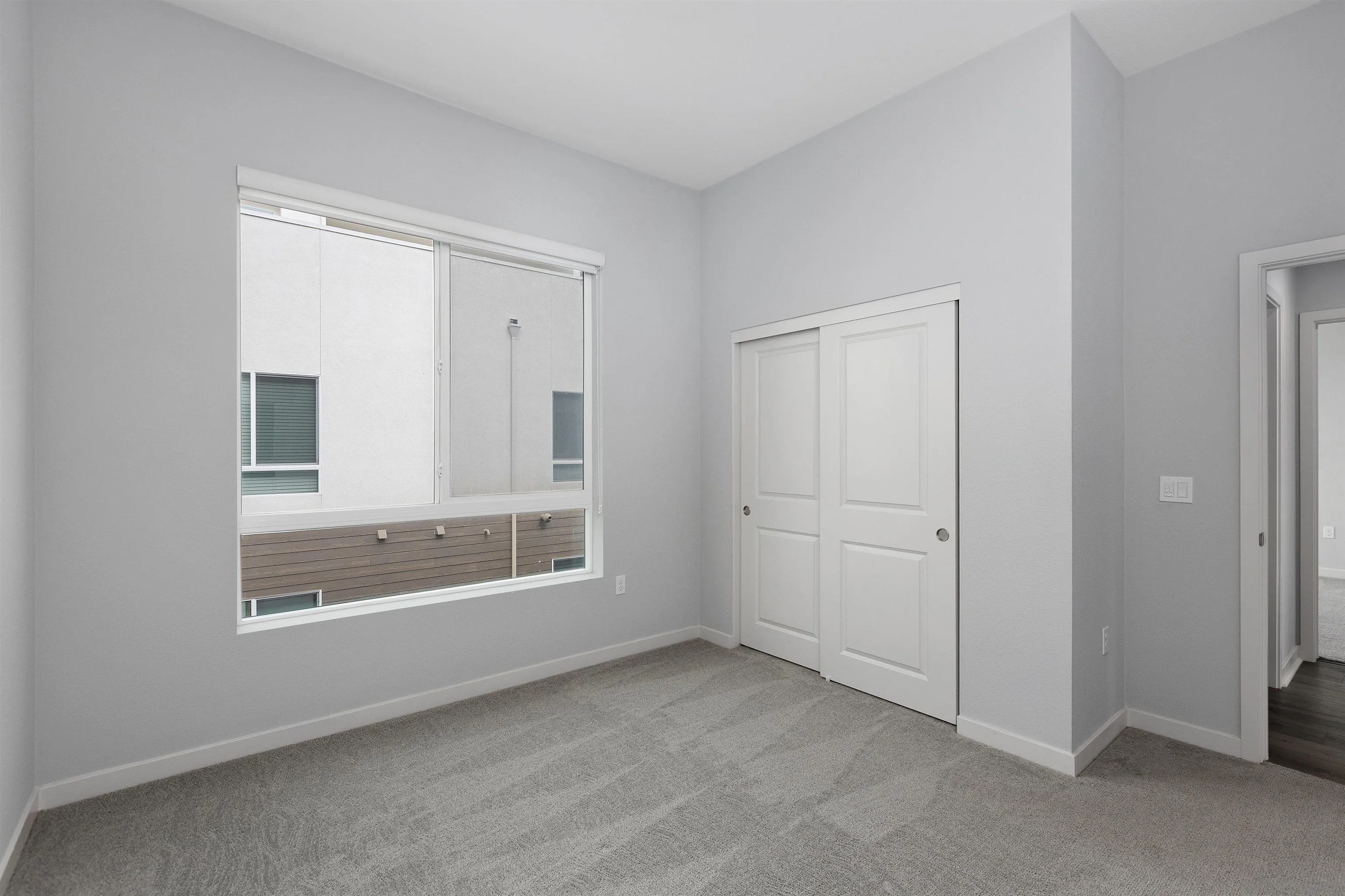 3002 Bravo Loop, Unit 4 Chula Vista, CA 91915 - Photo 23 of 36 a view of an empty room with a window