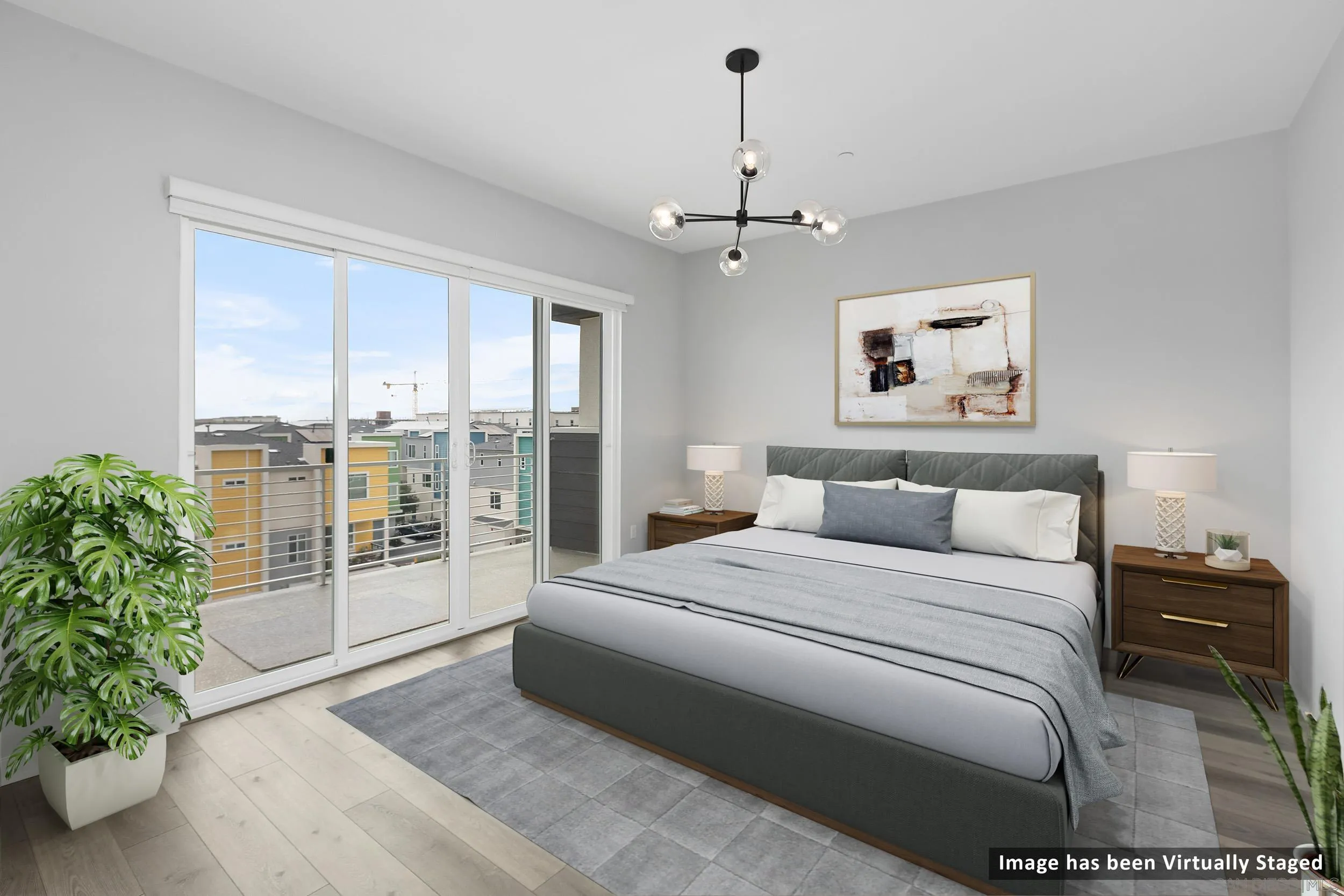 3002 Bravo Loop, Unit 4 Chula Vista, CA 91915 - Photo 5 of 36 a spacious bedroom with a balcony a bed and a window