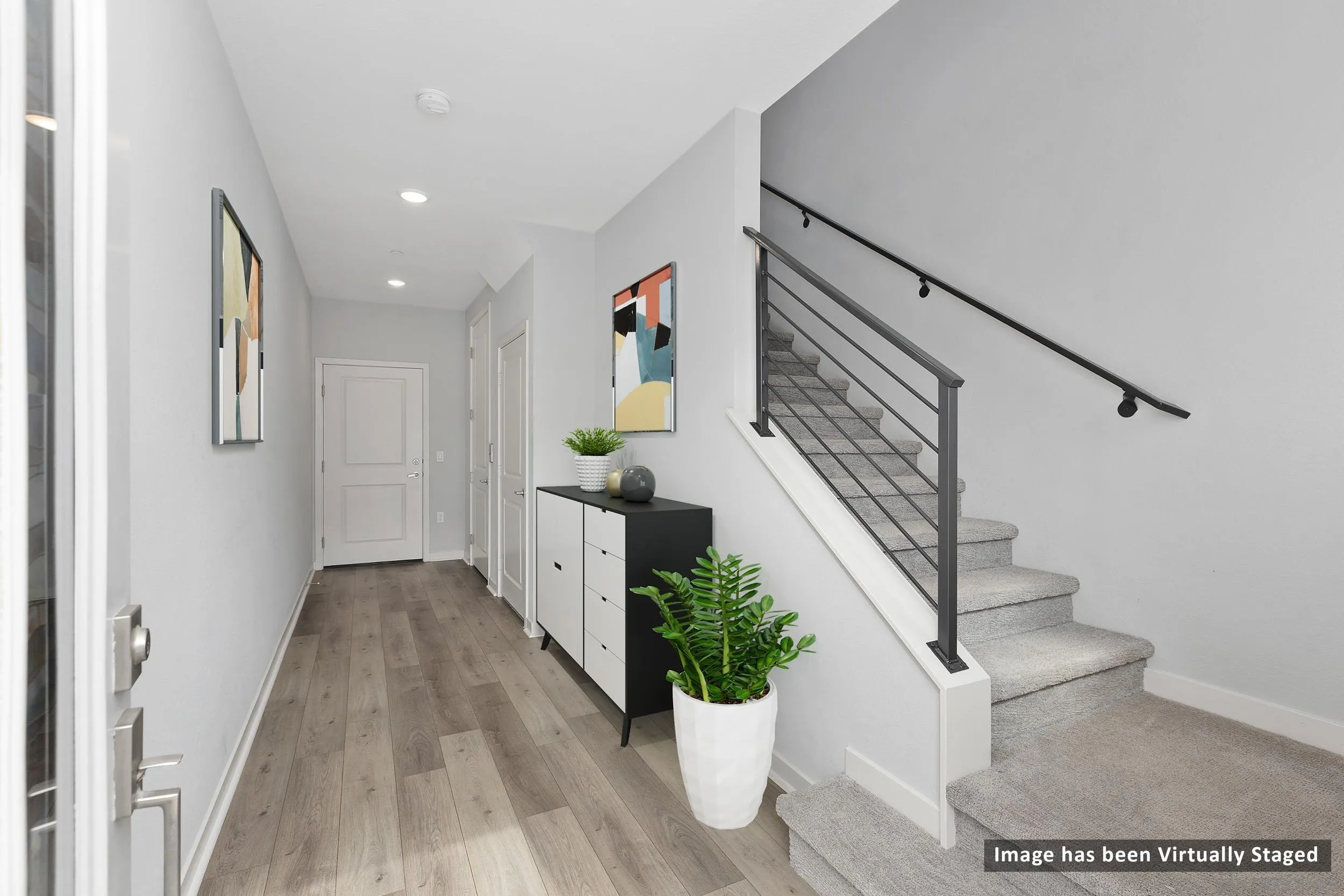 3002 Bravo Loop, Unit 4 Chula Vista, CA 91915 - Photo 6 of 36 a view of entryway and hall with wooden floor