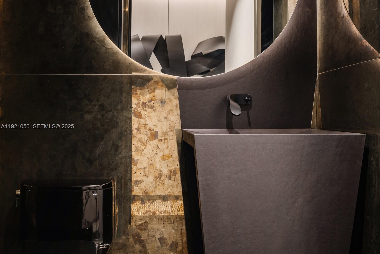 5875 Collins Avenue, Unit 902 Miami Beach, FL 33140 - Photo 19 of 34 Powder Room
