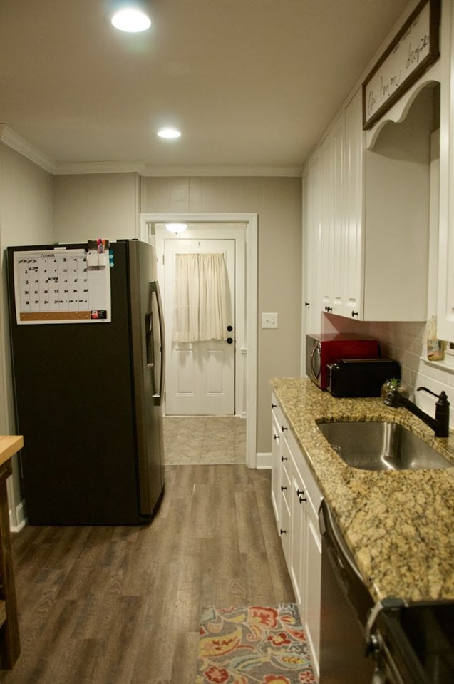 2120 Mary Hobby Road Raleigh, NC 27603 - Photo 7 of 30 Looking toward laundry room and back door Kitchen