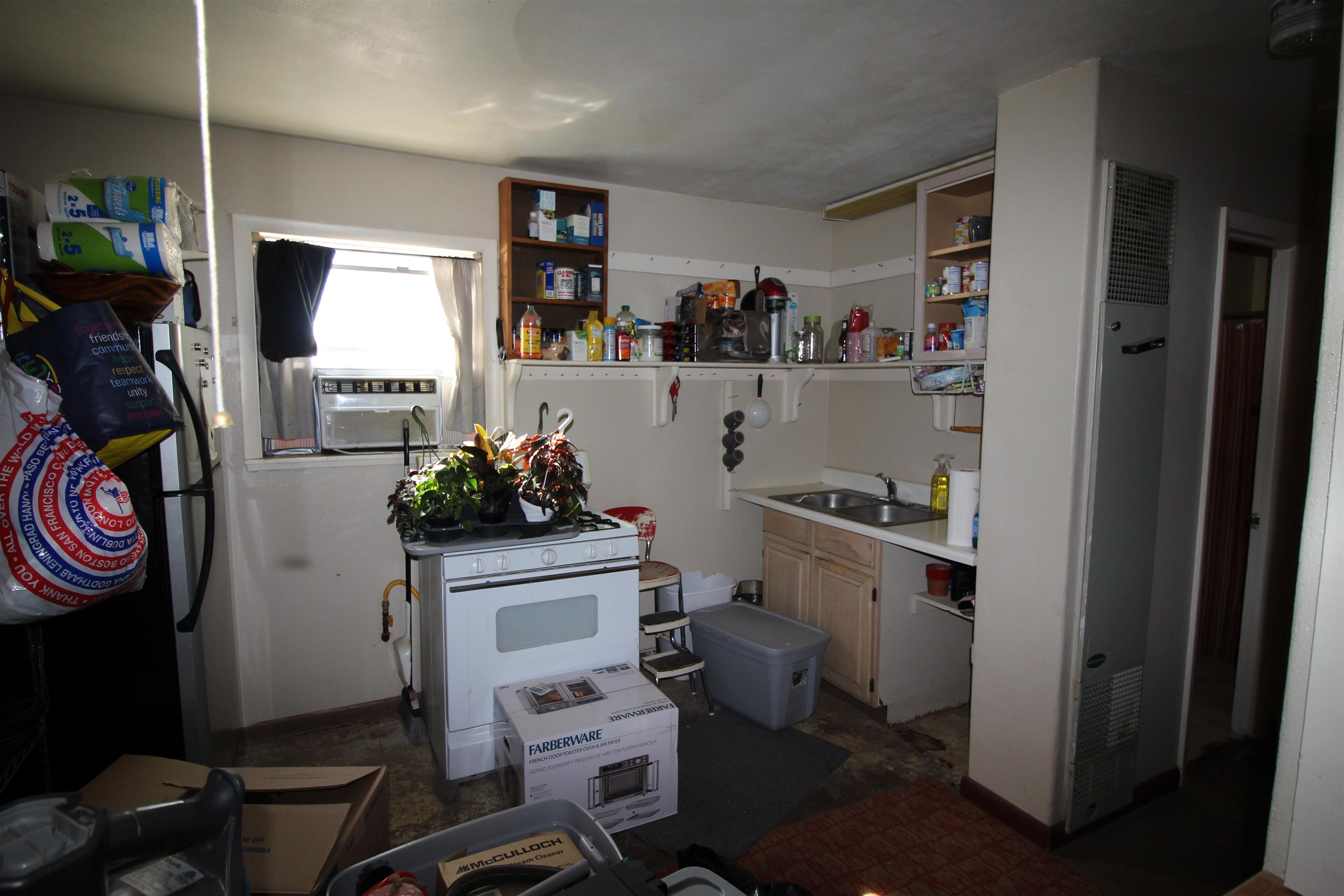 1873 K Road Fruita, CO 81521 - Photo 16 of 26 a room with storage and utility
