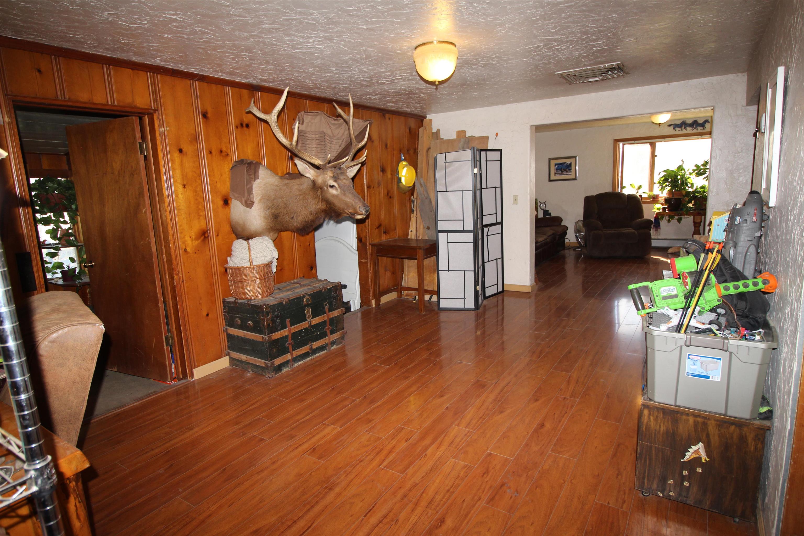 1873 K Road Fruita, CO 81521 - Photo 7 of 26 a view of a living room and dining room