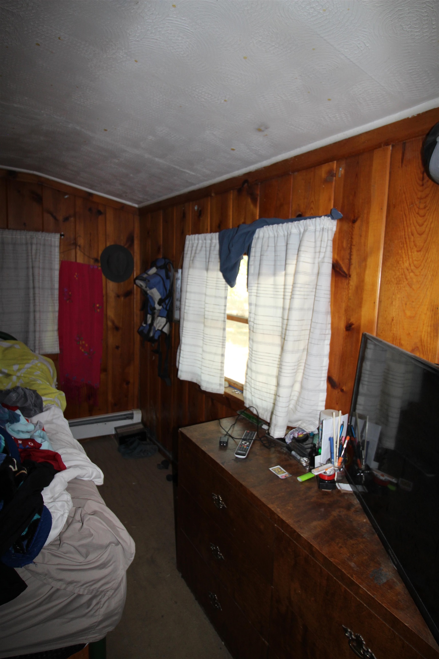 1873 K Road Fruita, CO 81521 - Photo 10 of 26 a room with furniture and a flat screen tv