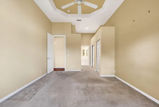 a bathroom with a sink a large mirror and a bathtub