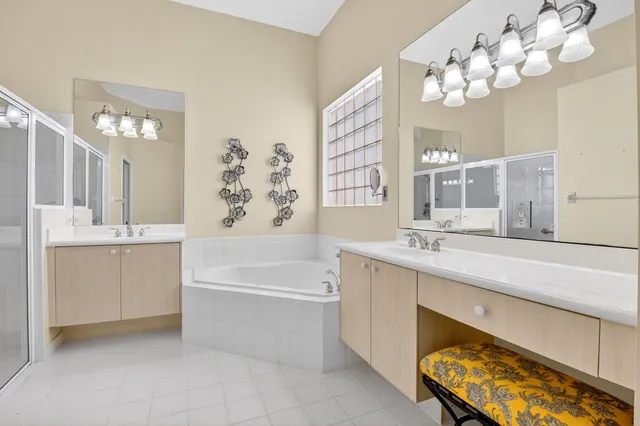 a bathroom with a sink a toilet and bathtub