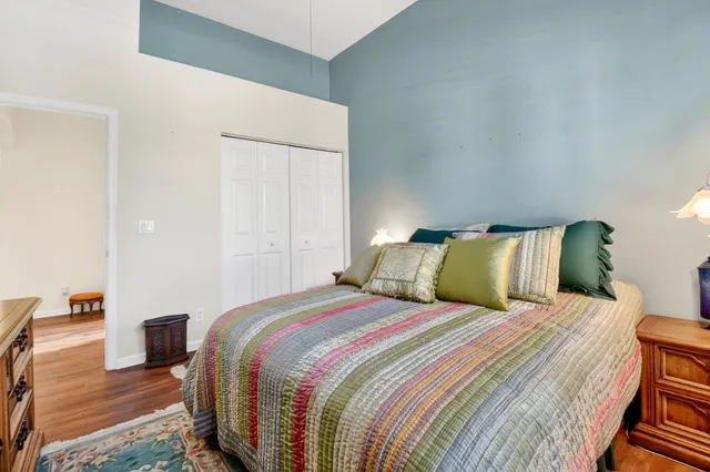 a view of a lake with houses in the back