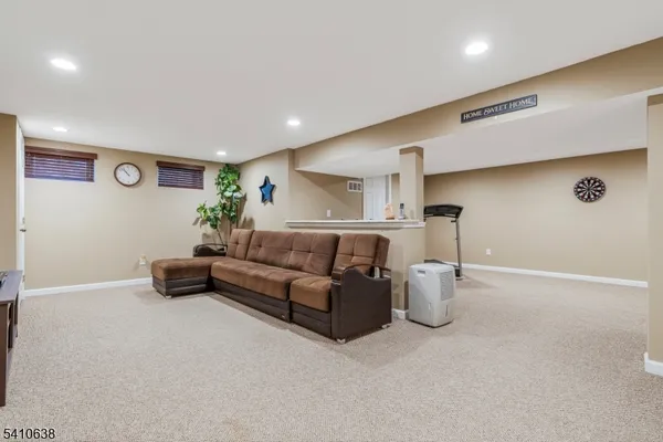 a living room with furniture and a couch