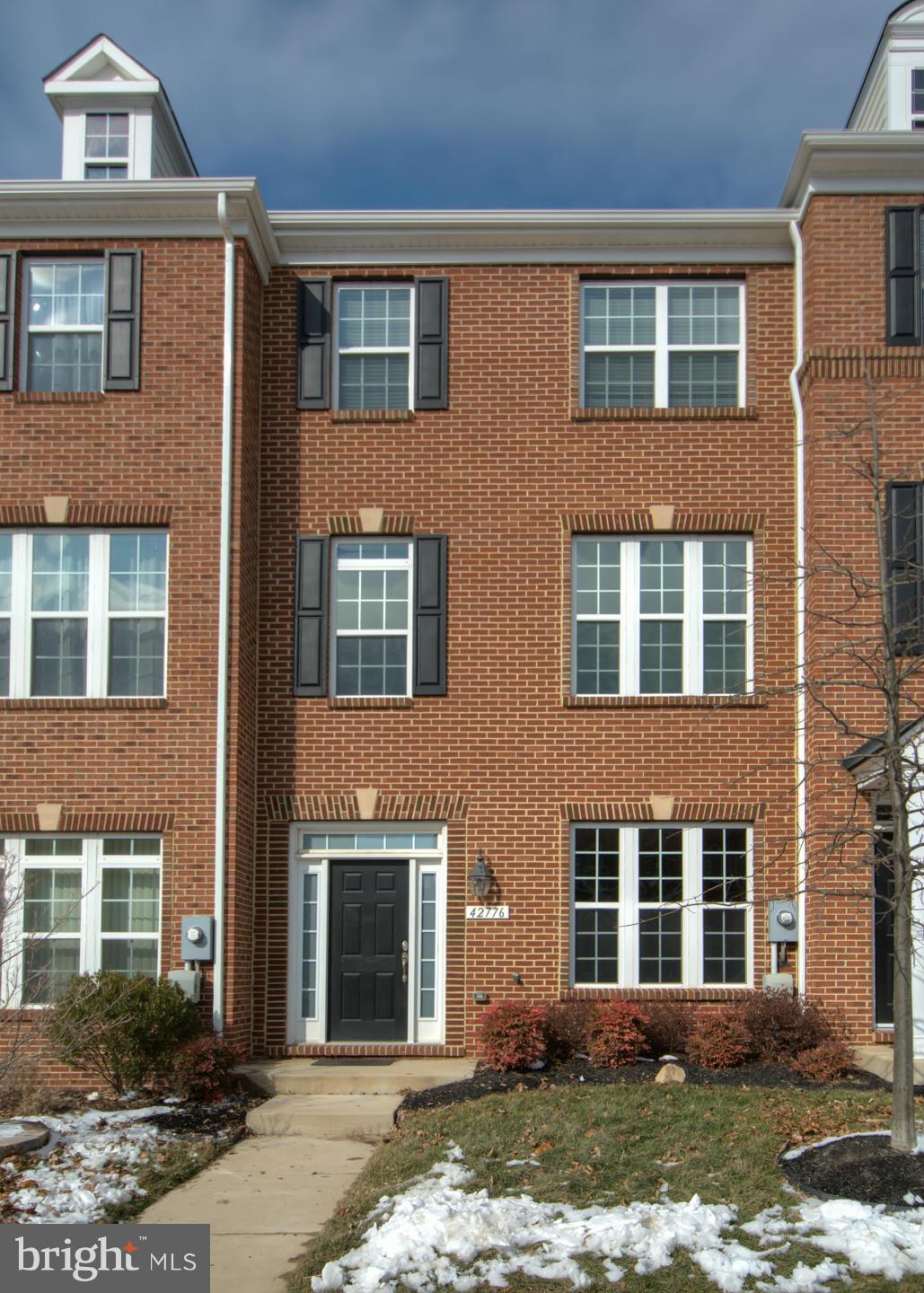 42776 Hay Road Ashburn, VA 20147 - Photo 1 of 30 Brick Front Two-Car Garage Townhome