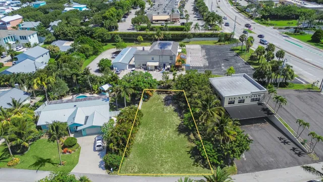 an aerial view of a house with a garden