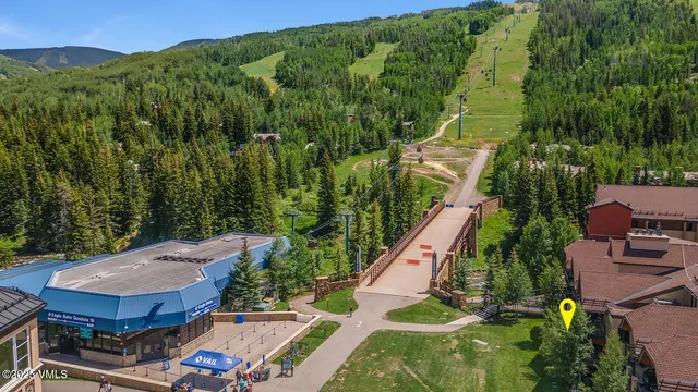 a bedroom with a bed and a fireplace