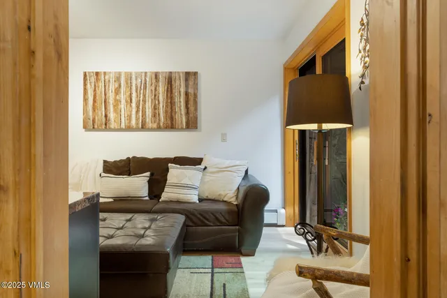 a kitchen with a refrigerator stainless steel appliances and cabinets