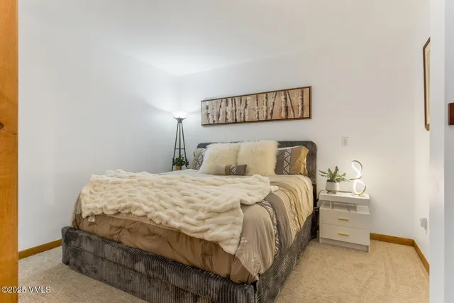 a view of a house with a backyard and a patio