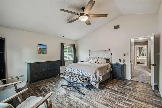 a bathroom with a toilet a sink and a mirror