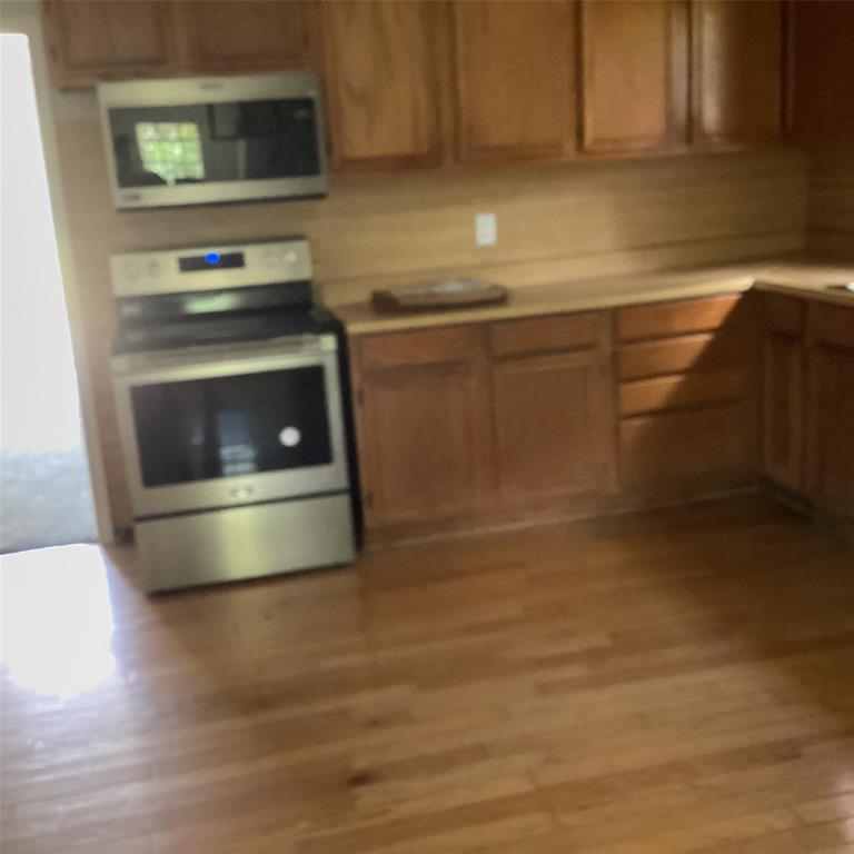 1506 South Travis Street Denison, TX 75021 - Photo 16 of 22 Kitchen with new stove