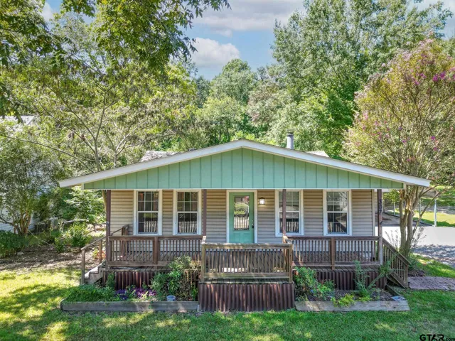 a house view with a garden space