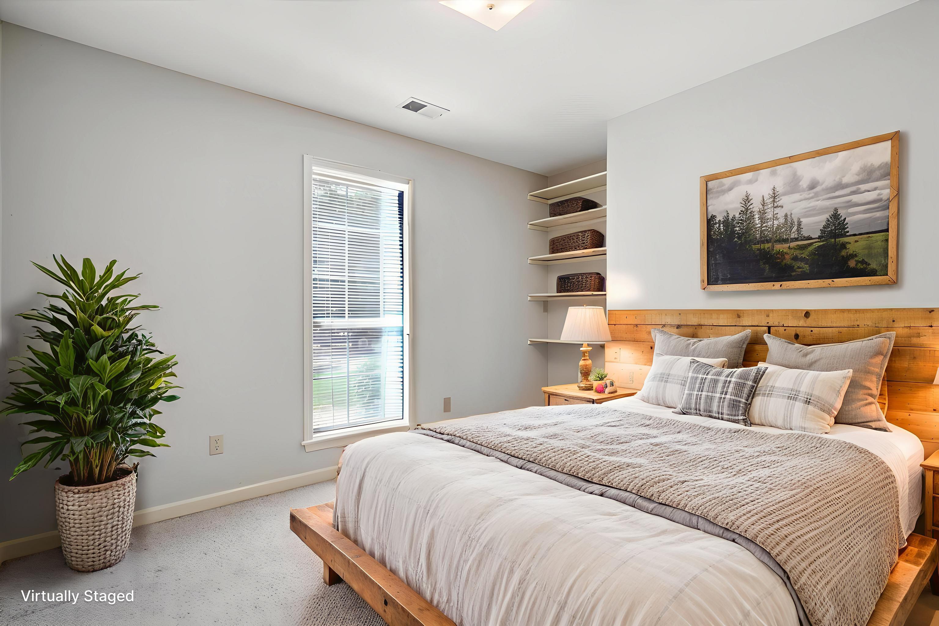 3365 Tomlin Road Somerville, TN 38068 - Photo 23 of 29 a bedroom with a bed and a potted plant