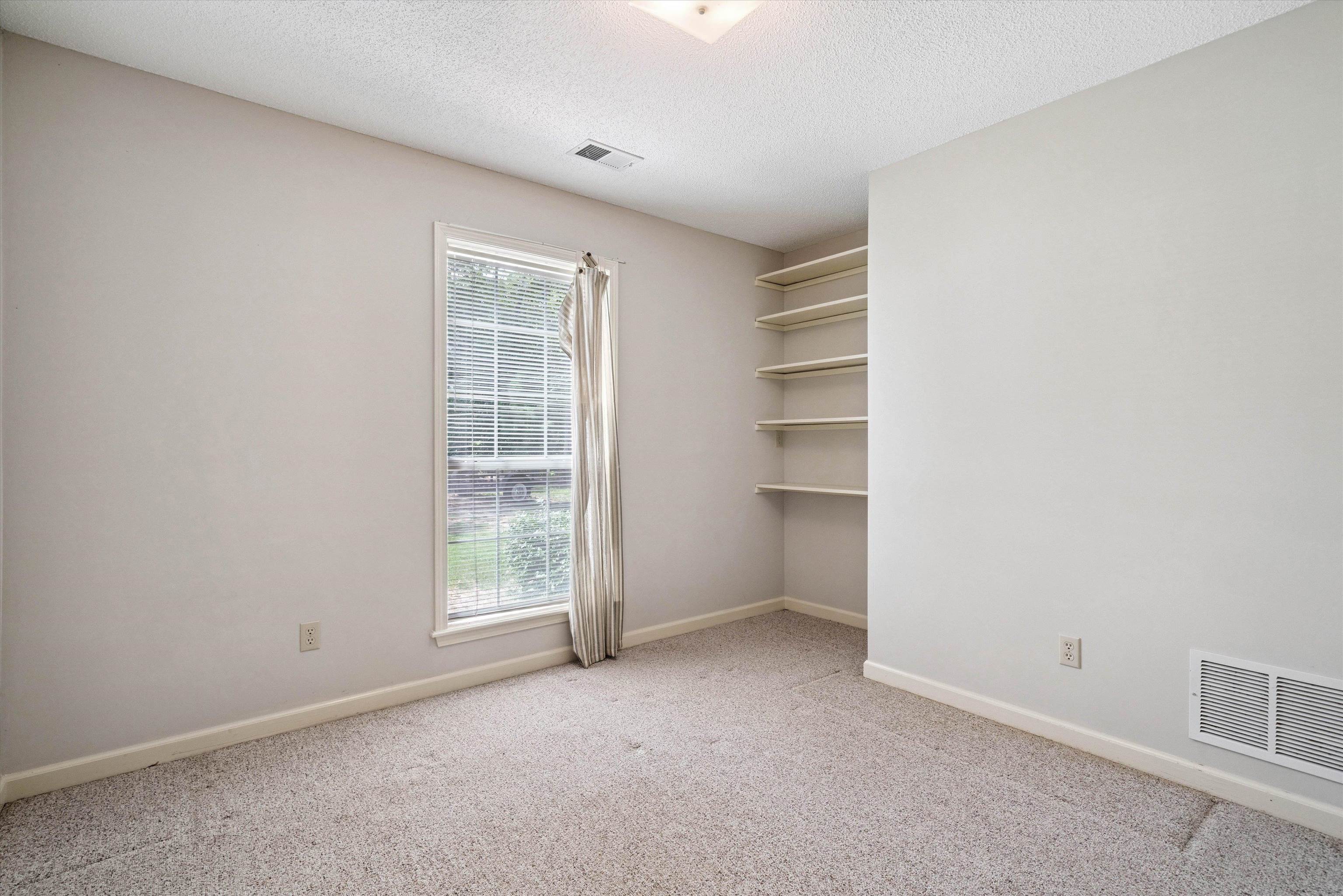 3365 Tomlin Road Somerville, TN 38068 - Photo 24 of 29 a view of an empty room with a window