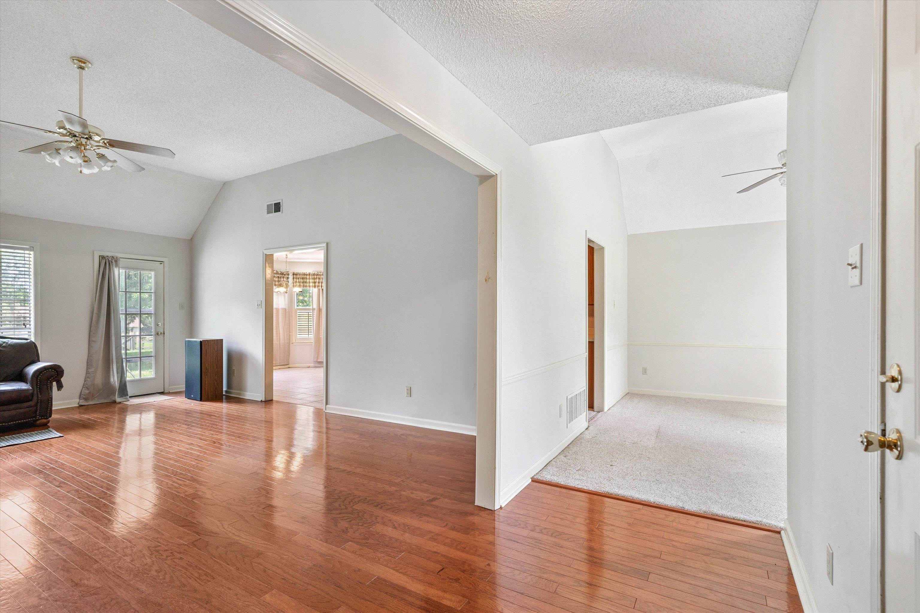 3365 Tomlin Road Somerville, TN 38068 - Photo 3 of 29 a view of a livingroom with wooden floor and a ceiling fan